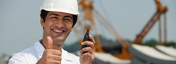 Structural Engineer on cell phone giving thumbs up